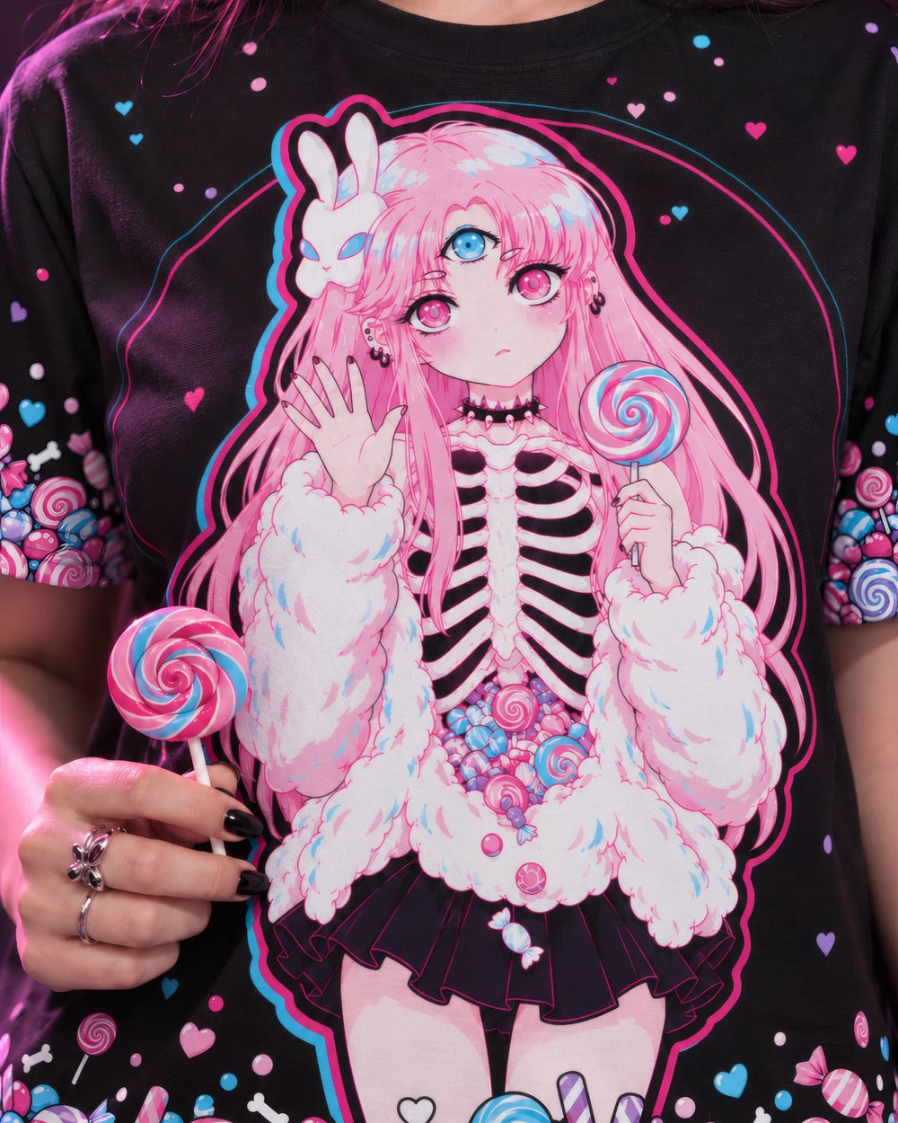 Close-up of the Maaya Hello Again all-over T-shirt front print with a swirl lollipop
